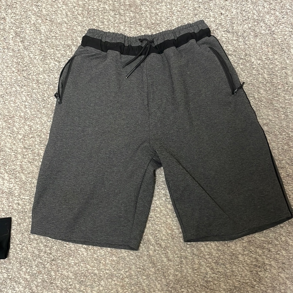 Light grey sweat shorts.